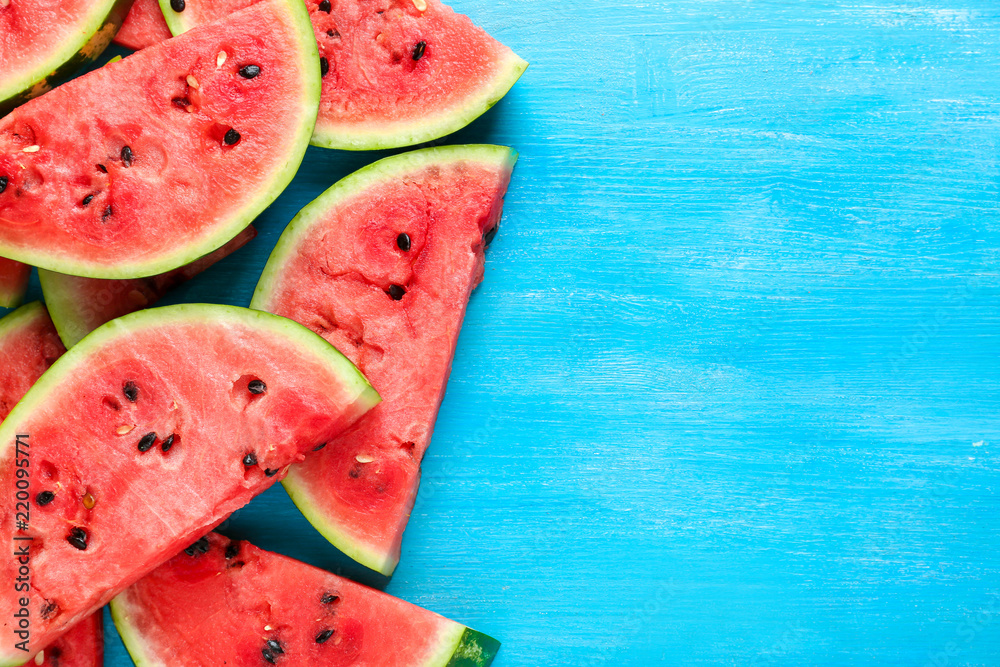 Slices of fresh watermelon on color table