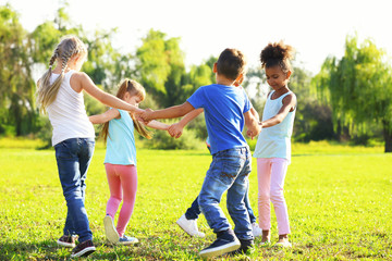 Canvas Print - Cute little children playing outdoors