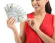 © Pixel-Shot - Happy young woman with dollar banknotes on white background
