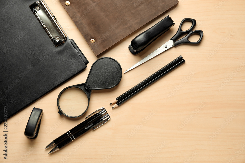 Set of school stationery on wooden background