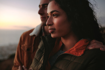 Wall Mural - Couple admiring the view from cliff