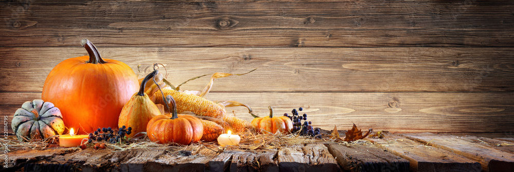 Thanksgiving Background - Pumpkins With Corncob And Candles On Rustic Wooden Table
 - obrazy, fototapety, plakaty 