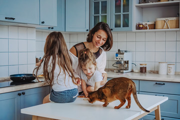 Happy family having fun in the kitchen