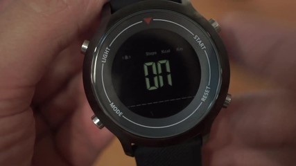 first time turning on smart watch pressing buttons. watches showing setup information on display