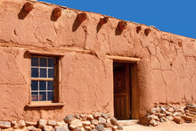 Rustic Santa Fe Style Adobe Building With Window Door