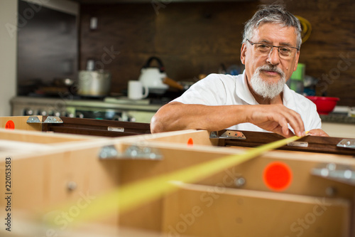 Diy Concept Senior Man Doing Putting Together Kitchen Cabinets