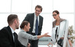 © ASDF - business team is discussing new information