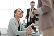 © ASDF - young Manager talking to the client.