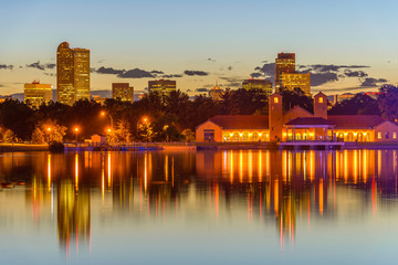 Wall Mural - City Park at Dusk - A summer evening view of Ferril Lake in Denver City Park, with city skyline in the background, at east-side of Downtown Denver, Colorado, USA.