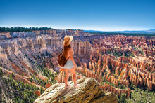 Girl Standing On The Top Of The Mountain Looking At Beautiful View. Inspiration Point. Bryce Canyon National Park,Utah, USA