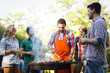 © NDABCREATIVITY - Happy students having barbecue on summer day