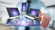 © sdecoret - Modern devices connected in businessman hand 3D rendering