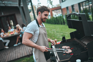 Group of friends on barbeque party