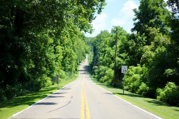 A sunny summer drive on a countryside highway.