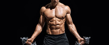 Sporty Man Working Out With Dumbbells. Photo Of Muscular Naked Torso On Black Background. Strength And Motivation