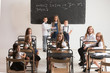 © master1305 - School children in classroom at lesson. The little boys and girls sitting at desks. Back to school, education, classroom, lesson, learn, lifestyle, childhood concept