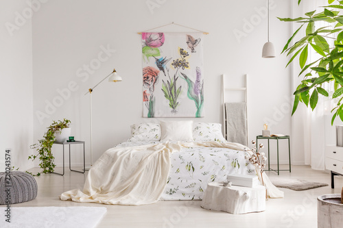 A Bright Eco Friendly Bedroom Interior With A Bed Dresses In