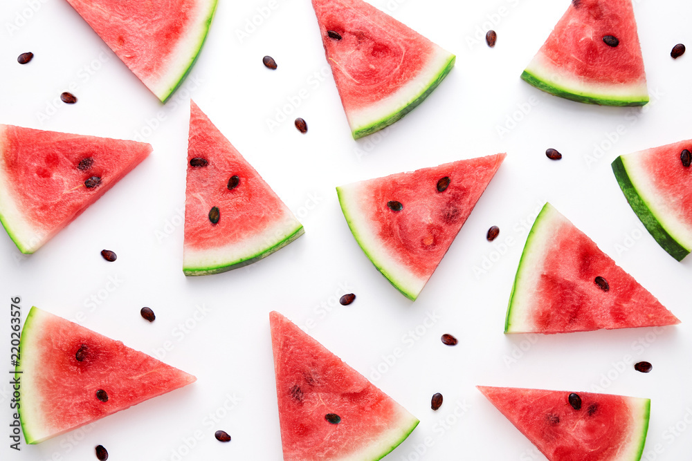 Watermelon slices pattern viewed from above. Top view. Summer concept. - obrazy, fototapety, plakaty 