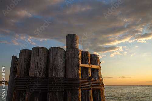 Fotografie, Obraz Pilings at Claiborne Landing Boat Launch in the Chesapeake Bay Talbot County Mid