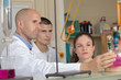 © auremar - teacher with students in laboratory