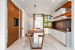 modern white and wood kitchen with breakfast bar and stools