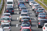 Rear view of traffic jam of lined up cars