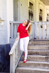 Wall Mural - Portrait of a girl. dressed in a red jacket.