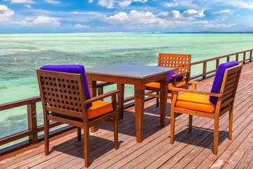 Table and chairs in the Maldives