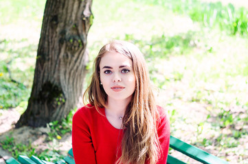 Wall Mural - Portrait of a girl. dressed in a red jacket.