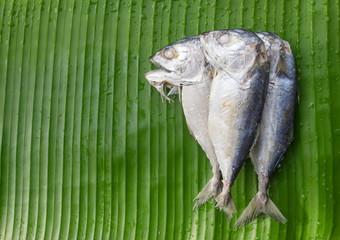 Wall Mural - (Thai mackerel fish steamed) on banana leaf background,Thai food.