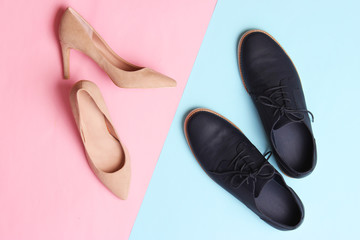 modern fashionable classic shoes, men's and women's shoes on a colored background top view.