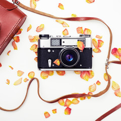 Flat lay. Top view. Old film camera. White background close-up. Vintage photo