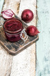 Red onion confiture in jar Vegetable jam