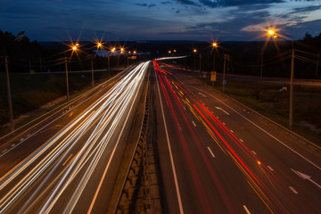 Night traffic road highway with car lights