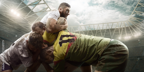 Obrazy Rugby  gracze-rugby-walcza-o-pilke-na-profesjonalnym-stadionie-rugby
