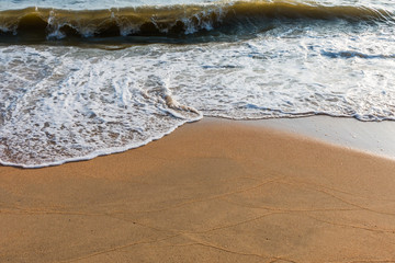 Waves washing sand