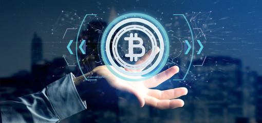 Poster - Man holding a technology Bitcoin icon on a circle 3d rendering