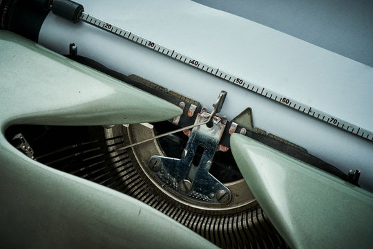 detailed view of the mechanism of an old gray typewriter