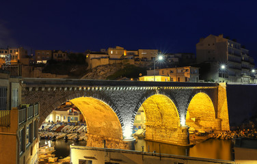 Wall Mural - Harbor at Vallon des Auffes with the famous old bridge in Marseille at night, France.