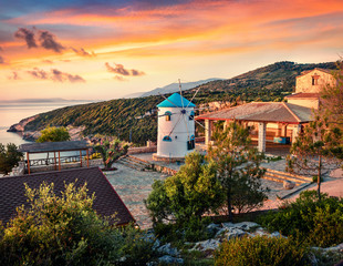 Wall Mural - fabulous morning scene of the contryside with windmill. colorful spring sunrise on the zakynthos isl