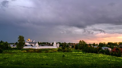 Sticker - Suzdal, Russia. Aerial view of Intercession (Pokrovsky) Monastery in Suzdal, Russia during a cloudy evening. Golden tour trip in Russia, time-lapse of sunset view, zoom in