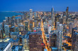 Chicago skyline with modern skyscrapers and the city lights taken at the blue hour, Illinois, United States
