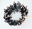 © ASDF - concept of team building .large successful business team sitting in a circle