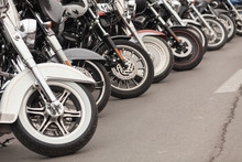 Row Of Motorcycles Parked On A Street