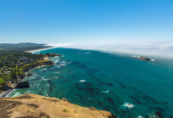 Wall Mural - Scenic view of Oregon coast and fog bank over the ocean