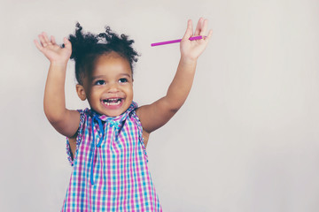 Wall Mural - Cheerful toddler having fun