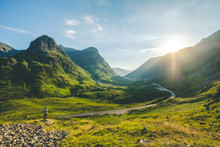 A Man Looking Standing Face To The Sun At Glencoe