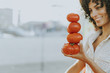 © Rawpixel.com - Woman buying tomatoes at a farmers market