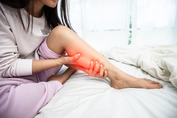 woman have a calf leg pain and muscle leg pain,healthcare concept