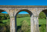 Fototapeta Na drzwi - View of the Chirk railway viaduct from a narrowboat on the Chirk Aquaduct. The later built Railway viaduct runs alongside the navigable aquaduct.